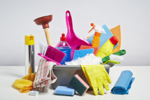 House cleaning products pile. Household chore concept on white background